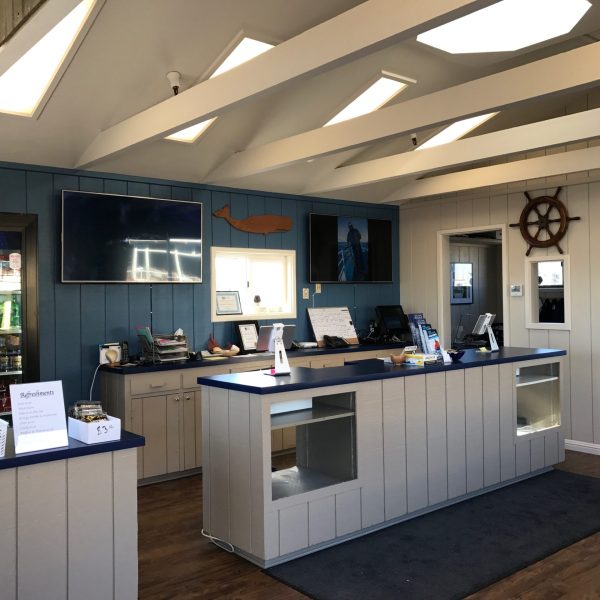 a kitchen with an island in the middle of a room