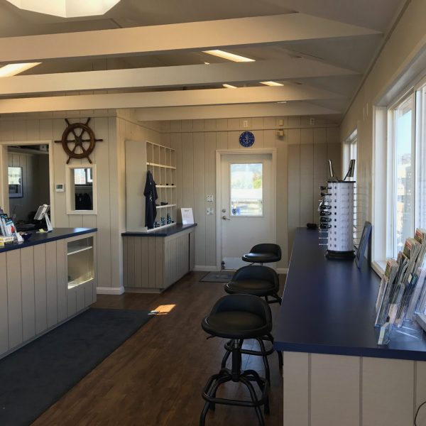 a room filled with furniture and a large window