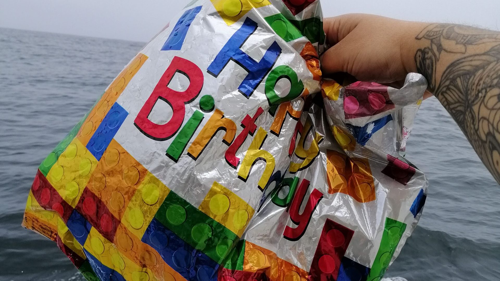 a colorful kite in the snow